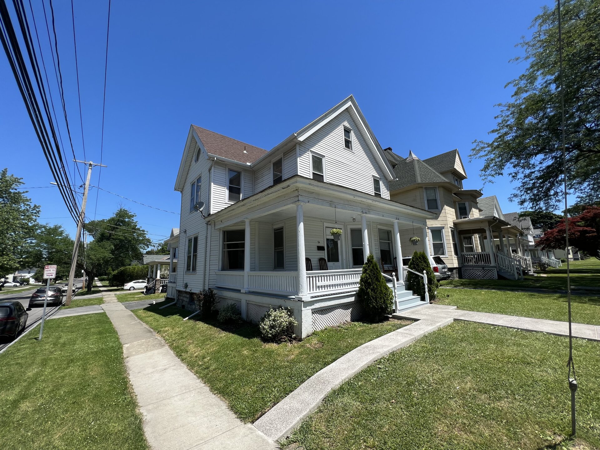 84 Hamilton Street exterior - white Victorian with porch